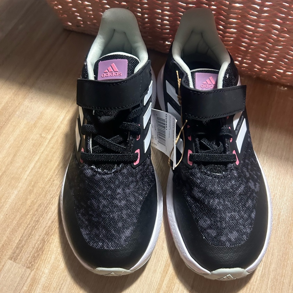 Black & white strap Adidas youth tennis shoes